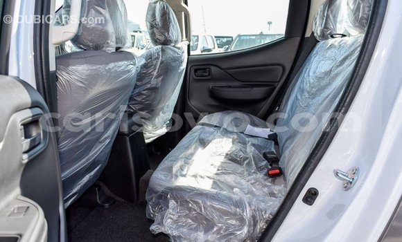 Sayi Imported Mitsubishi L200 White Mota in Import - Dubai a Benin Sayi Imported Mitsubishi L200 White Mota in Import - Dubai a Benin