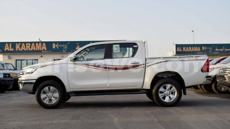 Big with watermark toyota hilux benign import dubai 7931