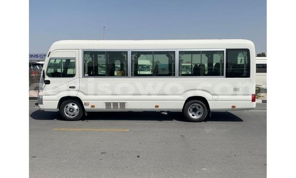 Sayi Imported Toyota Coaster White Babbar mota in Import - Dubai a Benin Sayi Imported Toyota Coaster White Babbar mota in Import - Dubai a Benin