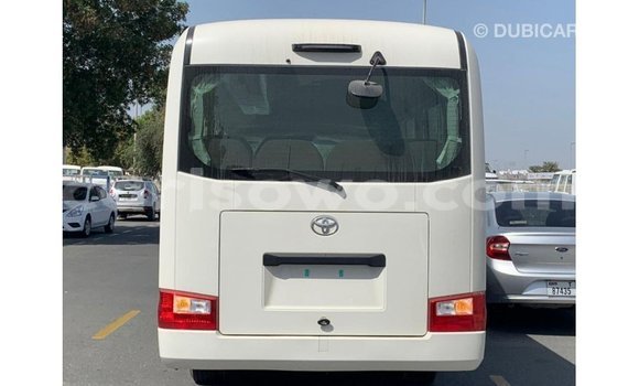 Sayi Imported Toyota Coaster White Babbar mota in Import - Dubai a Benin Sayi Imported Toyota Coaster White Babbar mota in Import - Dubai a Benin