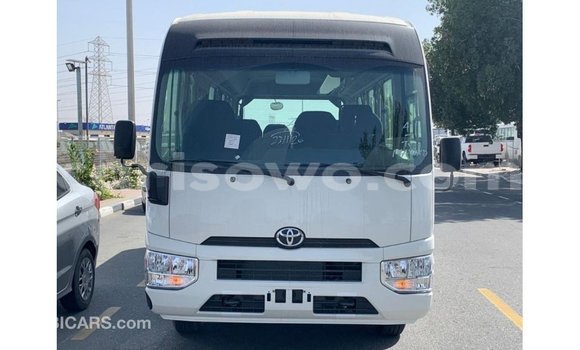 Sayi Imported Toyota Coaster White Babbar mota in Import - Dubai a Benin Sayi Imported Toyota Coaster White Babbar mota in Import - Dubai a Benin