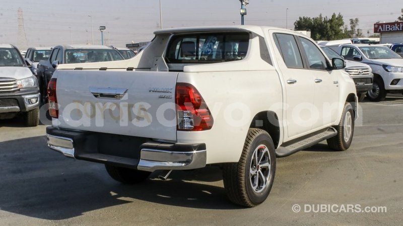 Big with watermark toyota hilux benign import dubai 8107