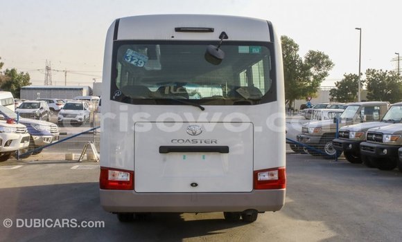 Sayi Imported Toyota Coaster White Babbar mota in Import - Dubai a Benin Sayi Imported Toyota Coaster White Babbar mota in Import - Dubai a Benin