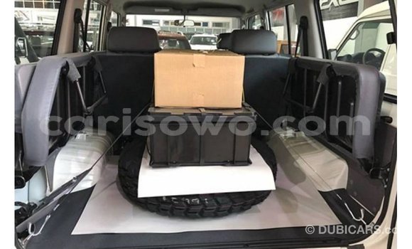 Sayi Imported Toyota Land Cruiser White Mota in Import - Dubai a Benin Sayi Imported Toyota Land Cruiser White Mota in Import - Dubai a Benin