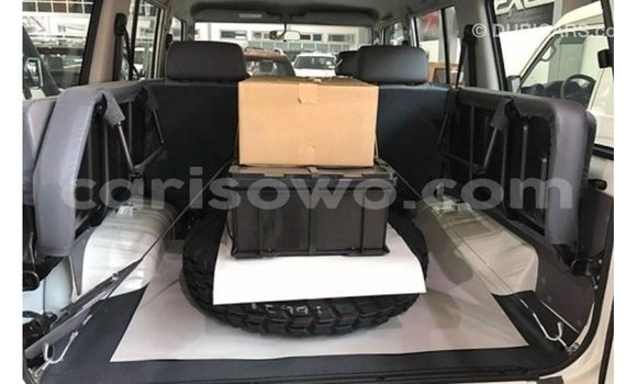 Sayi Imported Toyota Land Cruiser White Mota in Import - Dubai a Benin Sayi Imported Toyota Land Cruiser White Mota in Import - Dubai a Benin