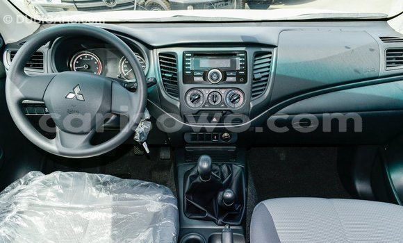 Buy Import Mitsubishi L200 White Car in Import - Dubai in Benign Buy Import Mitsubishi L200 White Car in Import - Dubai in Benign