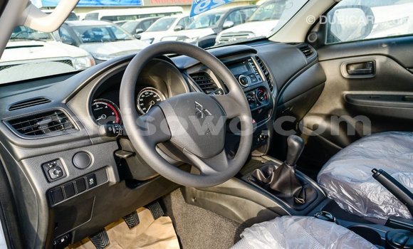 Buy Import Mitsubishi L200 White Car in Import - Dubai in Benign Buy Import Mitsubishi L200 White Car in Import - Dubai in Benign