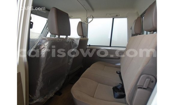 Sayi Imported Toyota Land Cruiser White Mota in Import - Dubai a Benin Sayi Imported Toyota Land Cruiser White Mota in Import - Dubai a Benin