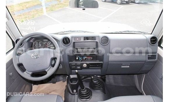 Sayi Imported Toyota Land Cruiser White Mota in Import - Dubai a Benin Sayi Imported Toyota Land Cruiser White Mota in Import - Dubai a Benin