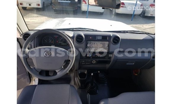 Sayi Imported Toyota Land Cruiser White Mota in Import - Dubai a Benin Sayi Imported Toyota Land Cruiser White Mota in Import - Dubai a Benin