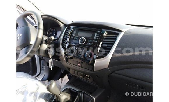 Buy Import Mitsubishi L200 White Car in Import - Dubai in Benign Buy Import Mitsubishi L200 White Car in Import - Dubai in Benign