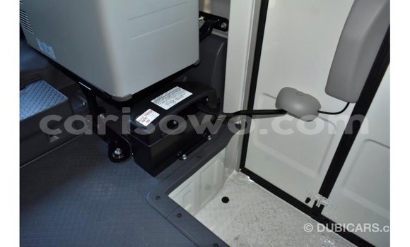 Acheter Import Utilitaire Toyota Coaster Blanc à Import - Dubai, Benin Acheter Import Utilitaire Toyota Coaster Blanc à Import - Dubai, Benin