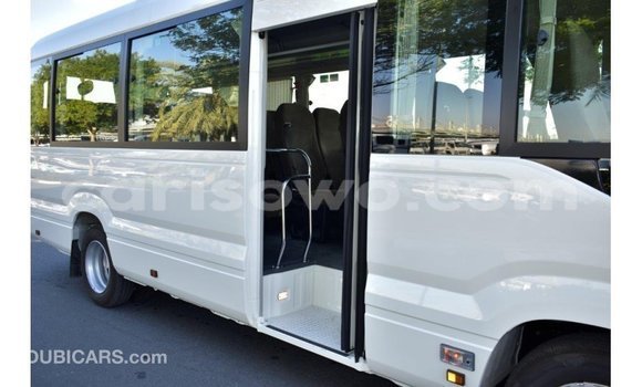 Acheter Import Utilitaire Toyota Coaster Blanc à Import - Dubai, Benin Acheter Import Utilitaire Toyota Coaster Blanc à Import - Dubai, Benin