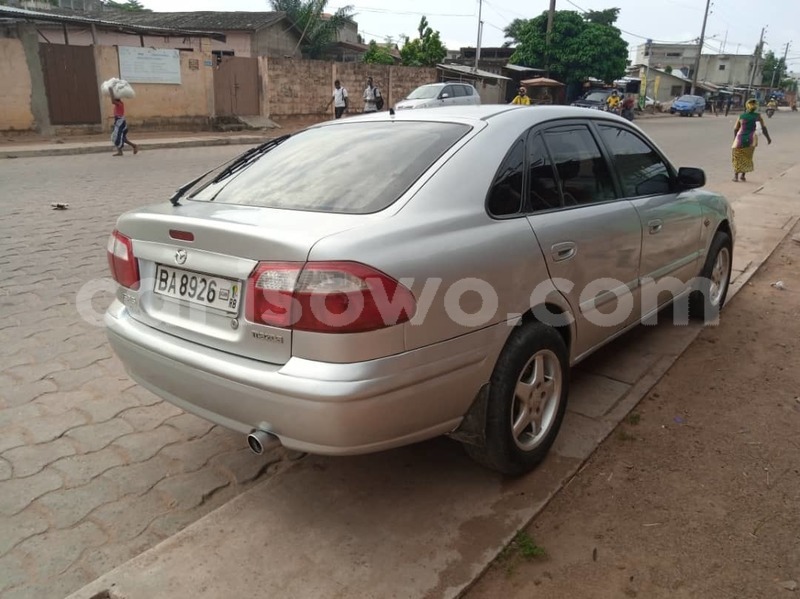 Big with watermark mazda 626 benign cotonou 8890