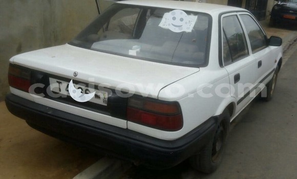 Sayi Na hannu Toyota Corolla White Mota in Cotonou a Benin
