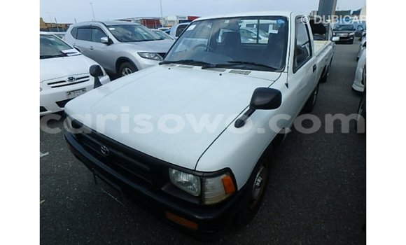 Sayi Imported Toyota Hilux White Mota in Import - Dubai a Benin Sayi Imported Toyota Hilux White Mota in Import - Dubai a Benin