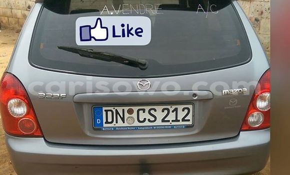 Buy Used Mazda 323 Silver Car in Comé in Benign Buy Used Mazda 323 Silver Car in Comé in Benign