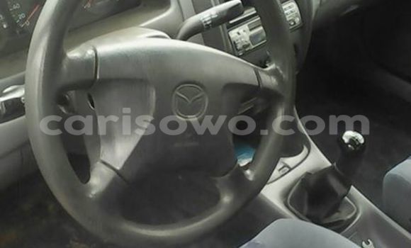 Buy Used Mazda 323 Black Car in Comé in Benign Buy Used Mazda 323 Black Car in Comé in Benign