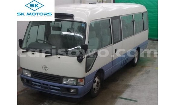 Sayi Imported Toyota Coaster White Babbar mota in Import - Dubai a Benin Sayi Imported Toyota Coaster White Babbar mota in Import - Dubai a Benin
