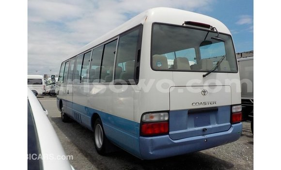Sayi Imported Toyota Coaster White Babbar mota in Import - Dubai a Benin Sayi Imported Toyota Coaster White Babbar mota in Import - Dubai a Benin