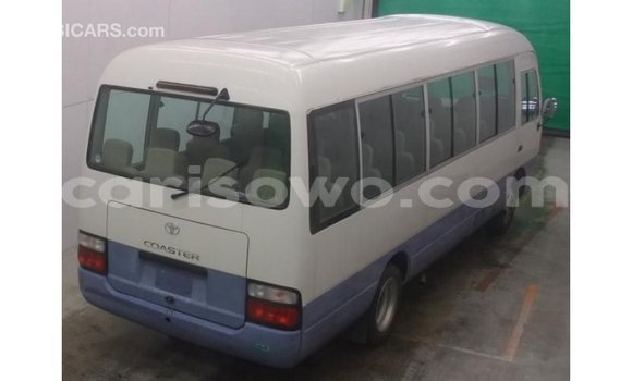 Sayi Imported Toyota Coaster White Babbar mota in Import - Dubai a Benin Sayi Imported Toyota Coaster White Babbar mota in Import - Dubai a Benin