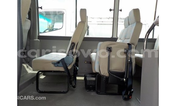 Sayi Imported Toyota Coaster White Babbar mota in Import - Dubai a Benin Sayi Imported Toyota Coaster White Babbar mota in Import - Dubai a Benin