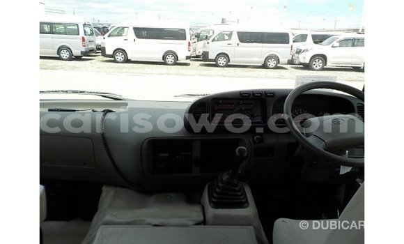 Sayi Imported Toyota Coaster White Babbar mota in Import - Dubai a Benin Sayi Imported Toyota Coaster White Babbar mota in Import - Dubai a Benin