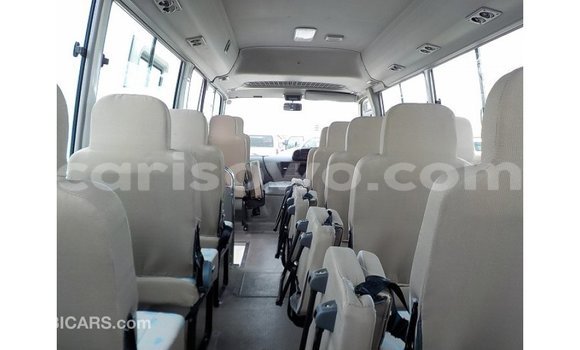 Sayi Imported Toyota Coaster White Babbar mota in Import - Dubai a Benin Sayi Imported Toyota Coaster White Babbar mota in Import - Dubai a Benin