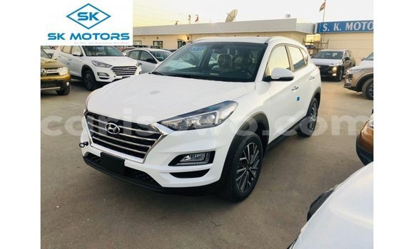 Sayi Imported Hyundai Tucson White Mota in Import - Dubai a Benin Sayi Imported Hyundai Tucson White Mota in Import - Dubai a Benin