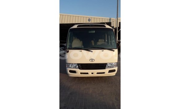 Sayi Imported Toyota Coaster White Babbar mota in Import - Dubai a Benin
