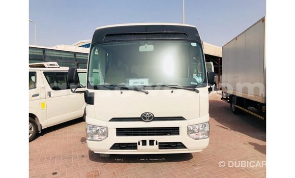 Acheter Import Utilitaire Toyota Coaster Blanc à Import - Dubai, Benin Acheter Import Utilitaire Toyota Coaster Blanc à Import - Dubai, Benin