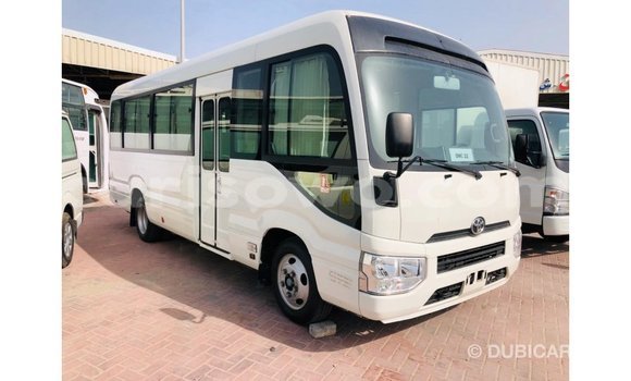 Acheter Import Utilitaire Toyota Coaster Blanc à Import - Dubai, Benin Acheter Import Utilitaire Toyota Coaster Blanc à Import - Dubai, Benin