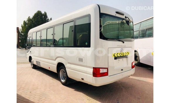 Acheter Import Utilitaire Toyota Coaster Blanc à Import - Dubai, Benin Acheter Import Utilitaire Toyota Coaster Blanc à Import - Dubai, Benin