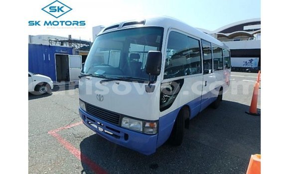 Sayi Imported Toyota Coaster White Babbar mota in Import - Dubai a Benin Sayi Imported Toyota Coaster White Babbar mota in Import - Dubai a Benin