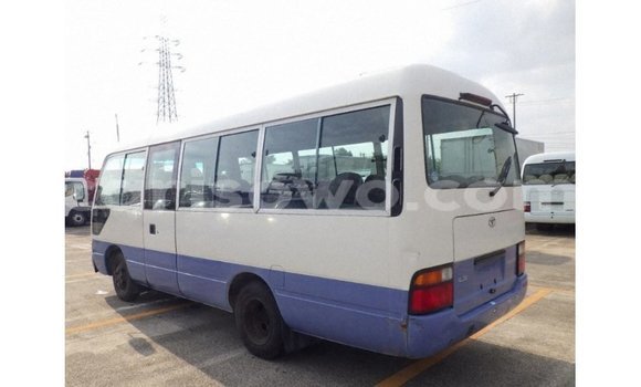 Sayi Imported Toyota Coaster White Babbar mota in Import - Dubai a Benin Sayi Imported Toyota Coaster White Babbar mota in Import - Dubai a Benin