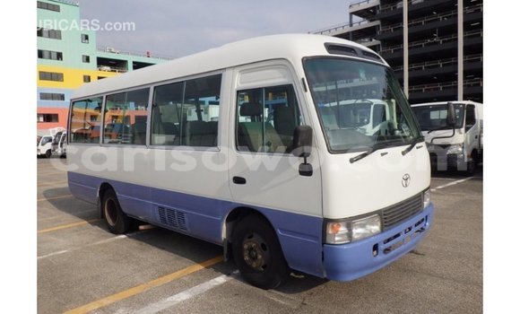Sayi Imported Toyota Coaster White Babbar mota in Import - Dubai a Benin Sayi Imported Toyota Coaster White Babbar mota in Import - Dubai a Benin