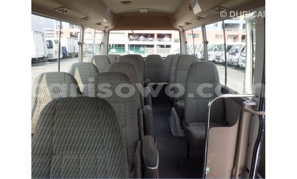 Sayi Imported Toyota Coaster White Babbar mota in Import - Dubai a Benin Sayi Imported Toyota Coaster White Babbar mota in Import - Dubai a Benin