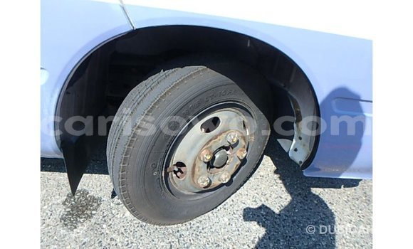 Sayi Imported Toyota Coaster White Babbar mota in Import - Dubai a Benin Sayi Imported Toyota Coaster White Babbar mota in Import - Dubai a Benin