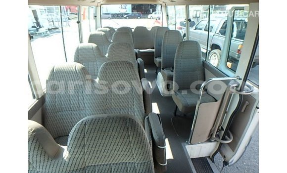 Sayi Imported Toyota Coaster White Babbar mota in Import - Dubai a Benin Sayi Imported Toyota Coaster White Babbar mota in Import - Dubai a Benin