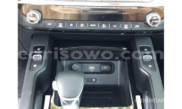 Sayi Imported Kia Carens White Mota in Import - Dubai a Benin Sayi Imported Kia Carens White Mota in Import - Dubai a Benin