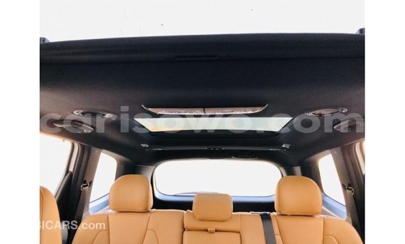 Sayi Imported Kia Carens White Mota in Import - Dubai a Benin Sayi Imported Kia Carens White Mota in Import - Dubai a Benin