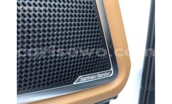 Sayi Imported Kia Carens White Mota in Import - Dubai a Benin Sayi Imported Kia Carens White Mota in Import - Dubai a Benin