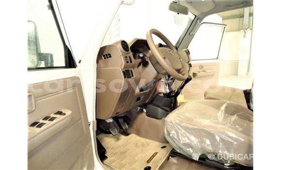 Sayi Imported Toyota Land Cruiser White Mota in Import - Dubai a Benin Sayi Imported Toyota Land Cruiser White Mota in Import - Dubai a Benin
