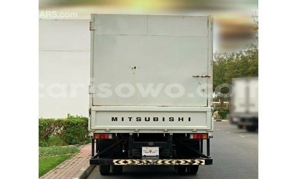 Sayi Imported Mitsubishi Carisma White Mota in Import - Dubai a Benin Sayi Imported Mitsubishi Carisma White Mota in Import - Dubai a Benin