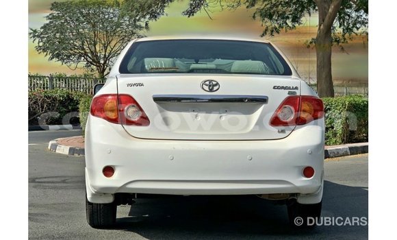 Sayi Imported Toyota Corolla White Mota in Import - Dubai a Benin Sayi Imported Toyota Corolla White Mota in Import - Dubai a Benin