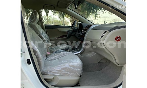 Sayi Imported Toyota Corolla White Mota in Import - Dubai a Benin Sayi Imported Toyota Corolla White Mota in Import - Dubai a Benin