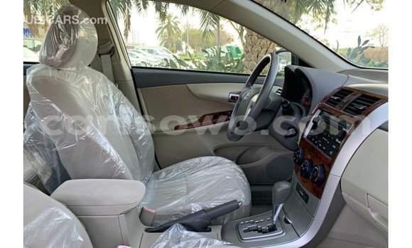 Sayi Imported Toyota Corolla White Mota in Import - Dubai a Benin Sayi Imported Toyota Corolla White Mota in Import - Dubai a Benin