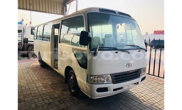 Acheter Import Utilitaire Toyota Coaster Blanc à Import - Dubai, Benin Acheter Import Utilitaire Toyota Coaster Blanc à Import - Dubai, Benin