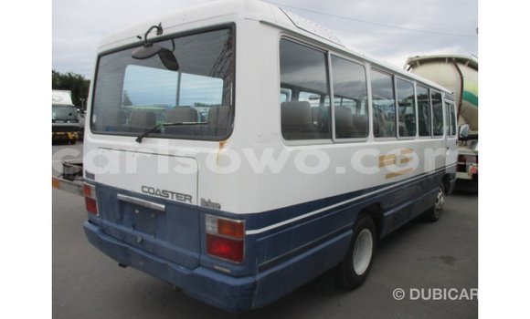 Acheter Import Utilitaire Toyota Coaster Blanc à Import - Dubai, Benin Acheter Import Utilitaire Toyota Coaster Blanc à Import - Dubai, Benin
