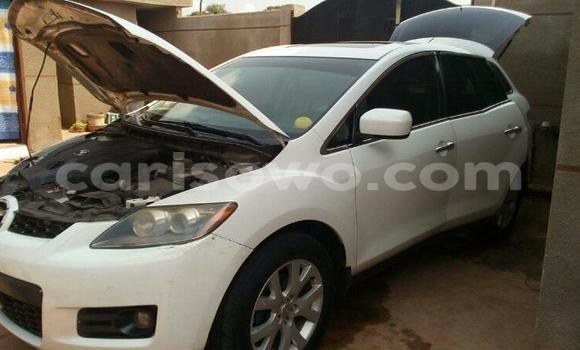 Sayi Na hannu Mazda 323 White Mota in Savalou a Benin Sayi Na hannu Mazda 323 White Mota in Savalou a Benin